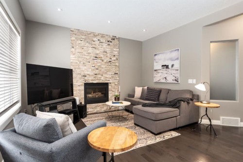178 Mt Douglas Circle Se, Calgary, AB - Indoor Photo Showing Living Room With Fireplace