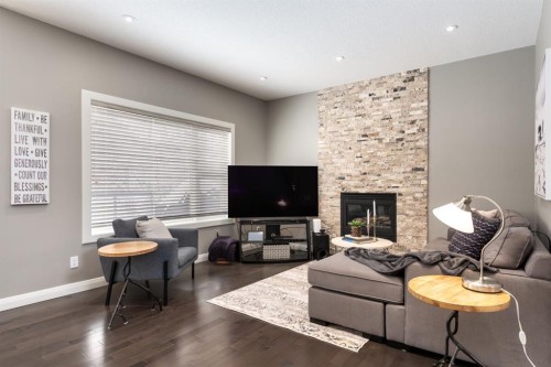 178 Mt Douglas Circle Se, Calgary, AB - Indoor Photo Showing Living Room With Fireplace