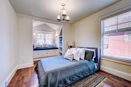 1707 Bowness Road Nw, Calgary, AB - Indoor Photo Showing Bedroom