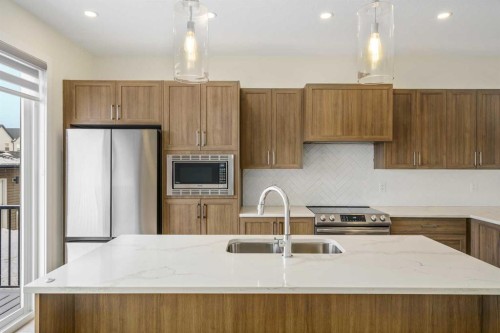 1308 South Point Parade Sw, Airdrie, AB - Indoor Photo Showing Kitchen With Double Sink With Upgraded Kitchen