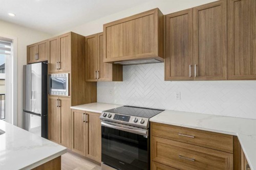 1308 South Point Parade Sw, Airdrie, AB - Indoor Photo Showing Kitchen