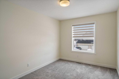 1308 South Point Parade Sw, Airdrie, AB - Indoor Photo Showing Other Room