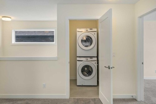 1308 South Point Parade Sw, Airdrie, AB - Indoor Photo Showing Laundry Room