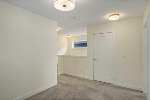 1308 South Point Parade Sw, Airdrie, AB - Indoor Photo Showing Other Room