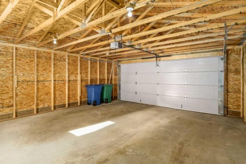 1308 South Point Parade Sw, Airdrie, AB - Indoor Photo Showing Garage