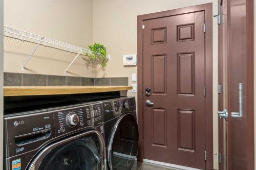 26 Mahogany Green Se, Calgary, AB - Indoor Photo Showing Laundry Room