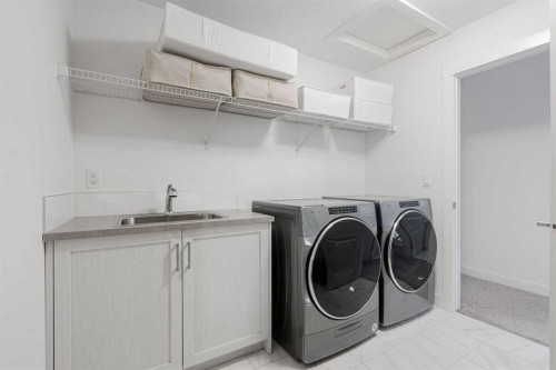 178 Sage Bluff Drive Nw, Calgary, AB - Indoor Photo Showing Laundry Room