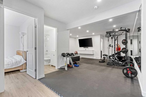 178 Sage Bluff Drive Nw, Calgary, AB - Indoor Photo Showing Gym Room