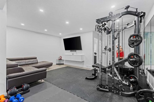 178 Sage Bluff Drive Nw, Calgary, AB - Indoor Photo Showing Gym Room