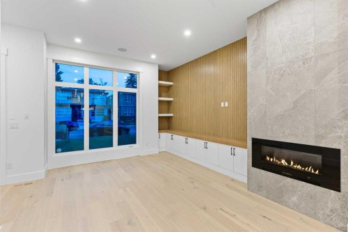 520 34A Street Nw, Calgary, AB - Indoor With Fireplace