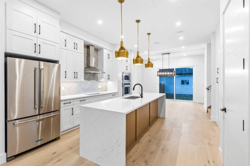 520 34A Street Nw, Calgary, AB - Indoor Photo Showing Kitchen With Stainless Steel Kitchen With Upgraded Kitchen