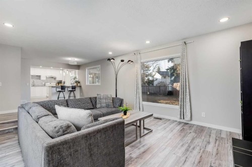 3394 Breton Close Nw, Calgary, AB - Indoor Photo Showing Living Room