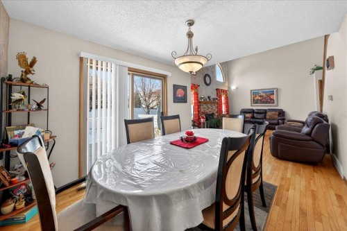 210 Shawinigan Way Sw, Calgary, AB - Indoor Photo Showing Dining Room