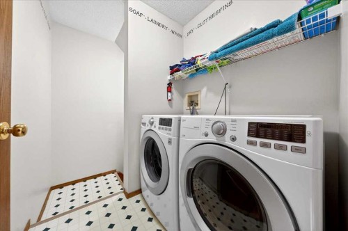 210 Shawinigan Way Sw, Calgary, AB - Indoor Photo Showing Laundry Room