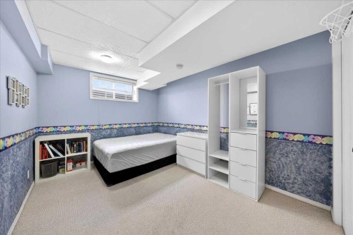 210 Shawinigan Way Sw, Calgary, AB - Indoor Photo Showing Bedroom