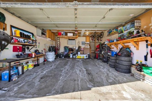 210 Shawinigan Way Sw, Calgary, AB - Indoor Photo Showing Garage