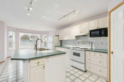 276 Hidden Valley Grove Nw, Calgary, AB - Indoor Photo Showing Kitchen With Double Sink