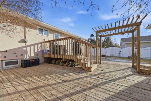 63 Huntmeadow Road Ne, Calgary, AB - Outdoor With Deck Patio Veranda With Exterior