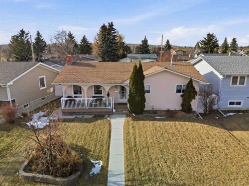 63 Huntmeadow Road Ne, Calgary, AB - Outdoor With Deck Patio Veranda