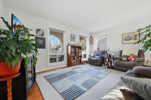 63 Huntmeadow Road Ne, Calgary, AB - Indoor Photo Showing Living Room