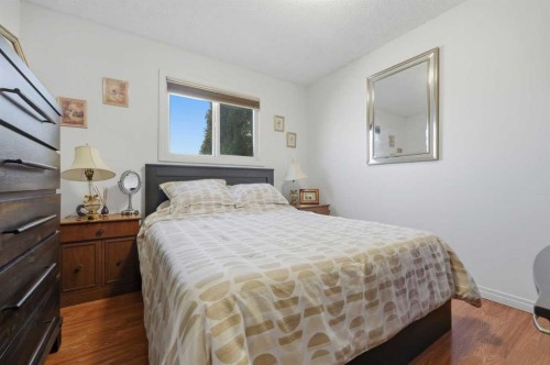 63 Huntmeadow Road Ne, Calgary, AB - Indoor Photo Showing Bedroom