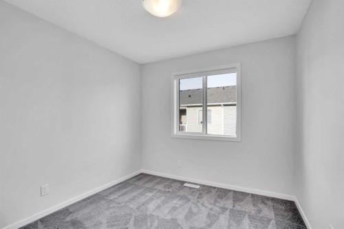 408 Windbury Link Sw, Airdrie, AB - Indoor Photo Showing Other Room