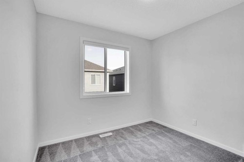 408 Windbury Link Sw, Airdrie, AB - Indoor Photo Showing Other Room