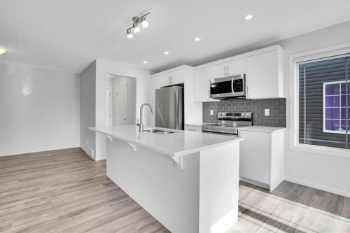 408 Windbury Link Sw, Airdrie, AB - Indoor Photo Showing Kitchen