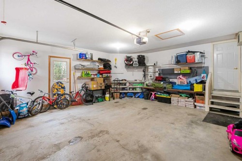 704 Woodside Drive, Airdrie, AB - Indoor Photo Showing Garage