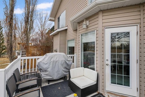 704 Woodside Drive, Airdrie, AB - Outdoor With Deck Patio Veranda With Exterior