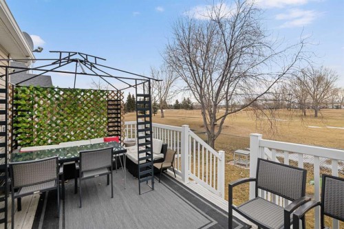704 Woodside Drive, Airdrie, AB - Outdoor With Deck Patio Veranda