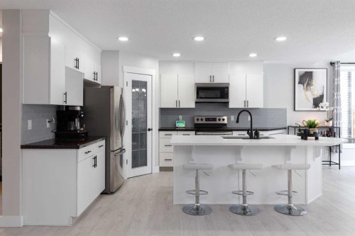 86 Cougarstone Court Sw, Calgary, AB - Indoor Photo Showing Kitchen With Upgraded Kitchen