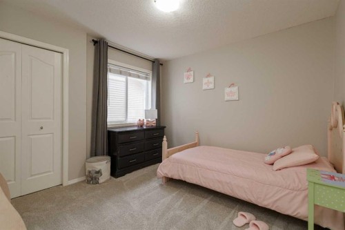 86 Cougarstone Court Sw, Calgary, AB - Indoor Photo Showing Bedroom