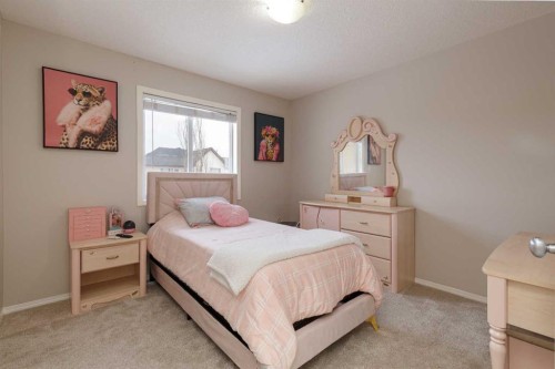 86 Cougarstone Court Sw, Calgary, AB - Indoor Photo Showing Bedroom