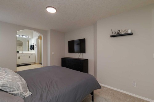 86 Cougarstone Court Sw, Calgary, AB - Indoor Photo Showing Bedroom