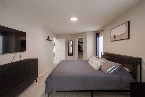 86 Cougarstone Court Sw, Calgary, AB - Indoor Photo Showing Bedroom