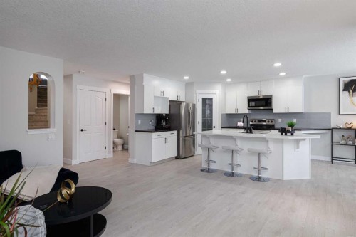 86 Cougarstone Court Sw, Calgary, AB - Indoor Photo Showing Kitchen With Upgraded Kitchen