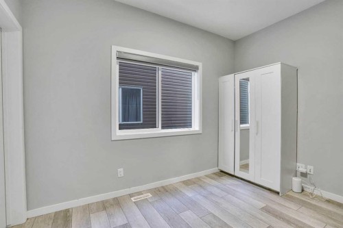 210 Lucas Close Nw, Calgary, AB - Indoor Photo Showing Other Room