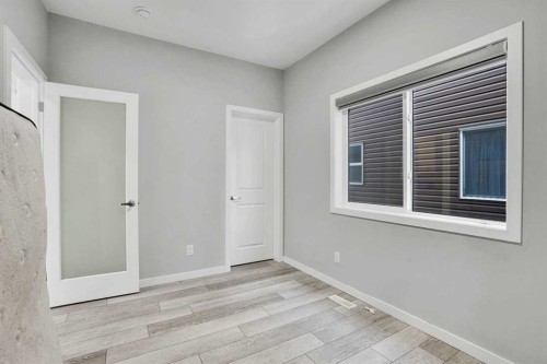 210 Lucas Close Nw, Calgary, AB - Indoor Photo Showing Other Room