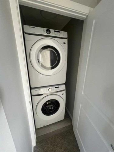 210 Lucas Close Nw, Calgary, AB - Indoor Photo Showing Laundry Room