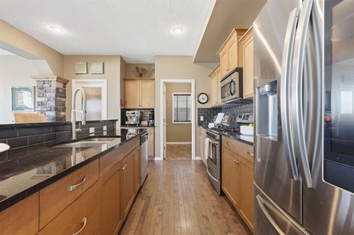 166 Cranridge Terrace Se, Calgary, AB - Indoor Photo Showing Kitchen With Stainless Steel Kitchen With Double Sink With Upgraded Kitchen