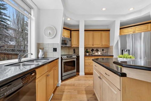 12069 Valley Ridge Drive Nw, Calgary, AB - Indoor Photo Showing Kitchen With Double Sink