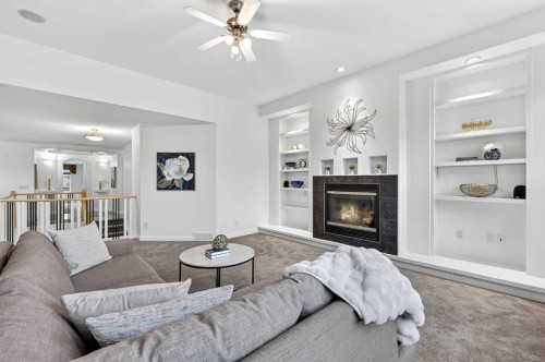 12069 Valley Ridge Drive Nw, Calgary, AB - Indoor Photo Showing Living Room With Fireplace