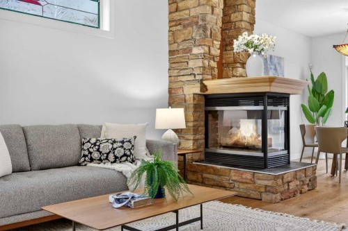 12069 Valley Ridge Drive Nw, Calgary, AB - Indoor Photo Showing Living Room With Fireplace
