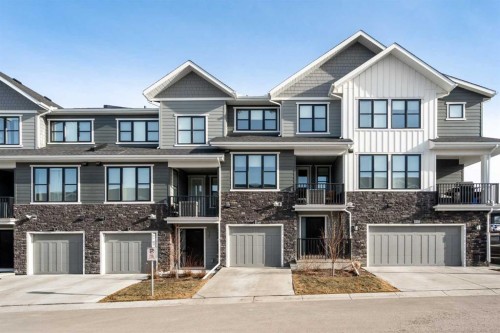915 Crestridge Common Sw, Calgary, AB - Outdoor With Balcony With Facade