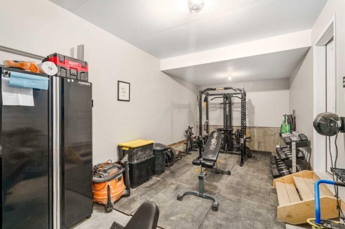 915 Crestridge Common Sw, Calgary, AB - Indoor Photo Showing Gym Room