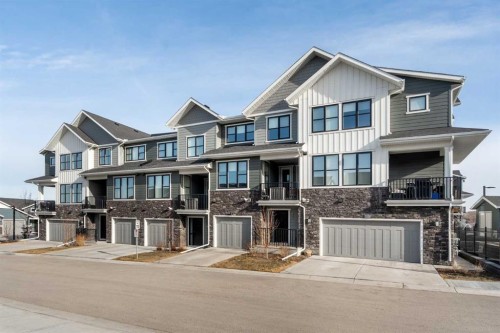 915 Crestridge Common Sw, Calgary, AB - Outdoor With Balcony With Facade