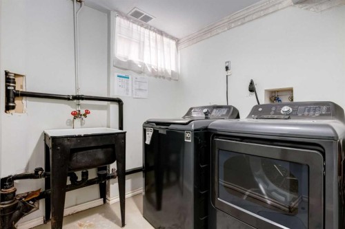 911 80 Avenue Sw, Calgary, AB - Indoor Photo Showing Laundry Room