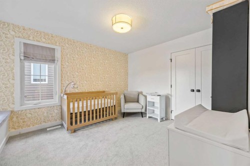 656 Bayview Way Sw, Airdrie, AB - Indoor Photo Showing Bedroom