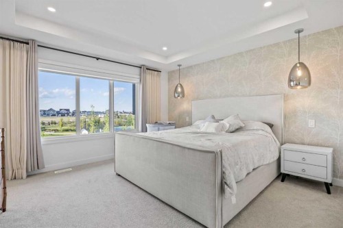 656 Bayview Way Sw, Airdrie, AB - Indoor Photo Showing Bedroom